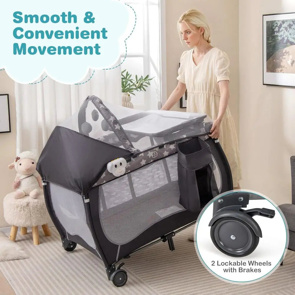 Pack and Play, 4 in 1 Portable Baby Playard with Bassinet, Changing Table, Lockable Wheels, Music Box, oldable Travel Baby Crib